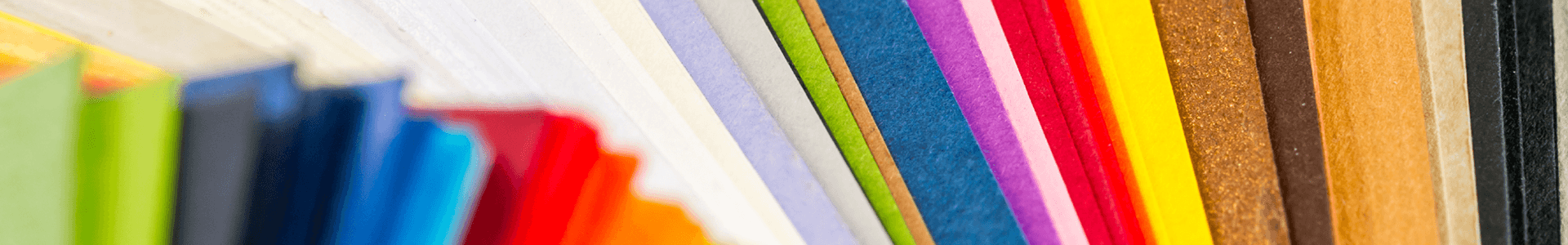 Zoomed-in image of various colored papers