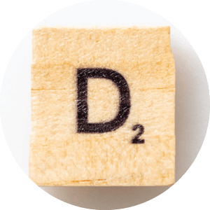 A wooden block with the letter D and a subscript of 2